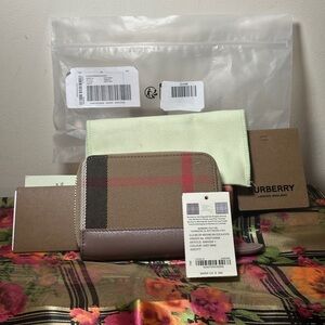 NWT Burberry zip wallet.